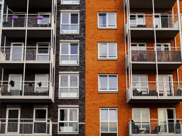 Two apartment buildings in Kenya compared side by side.