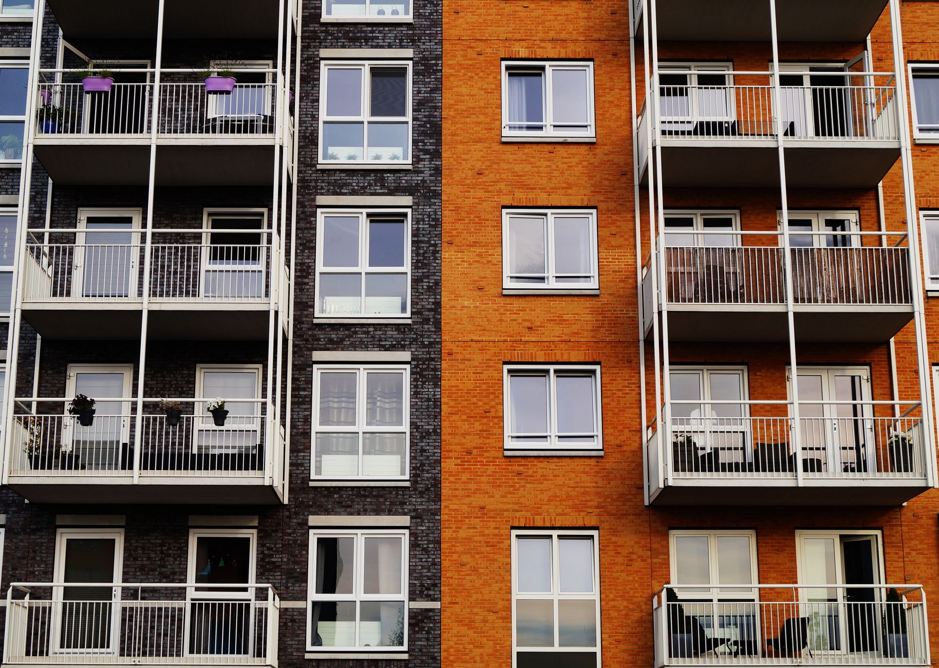 Two apartment buildings in Kenya compared side by side.