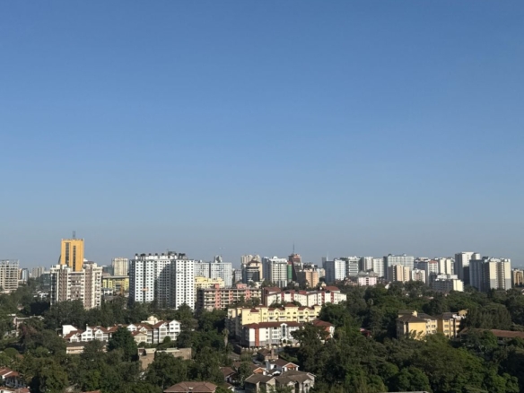 Two Nairobi skylines, Kilimani and Westlands property market comparison.