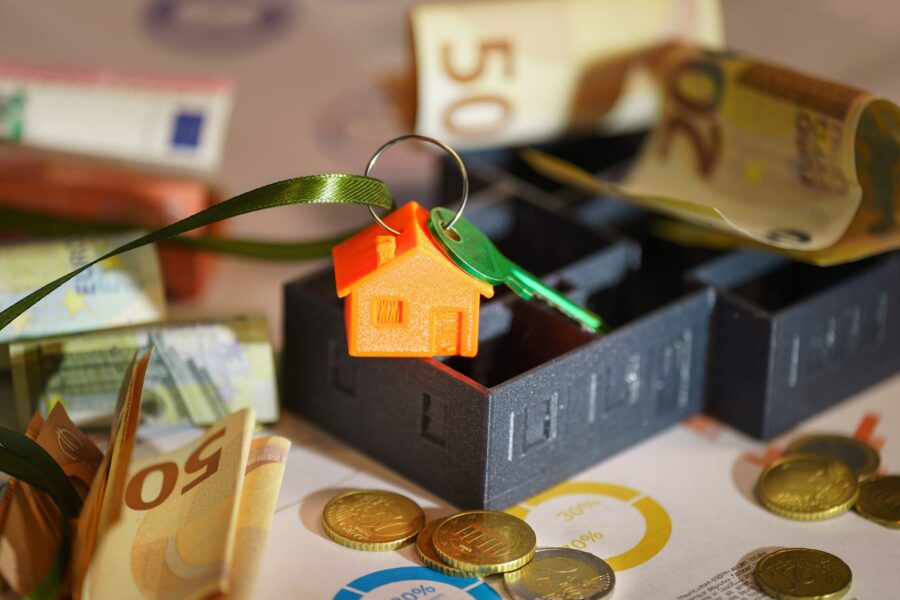 Real Estate Agency Fees - Real estate agent in office discussing fees for property in Kenya.